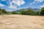 Tennis court is shared with other cottages in the estate